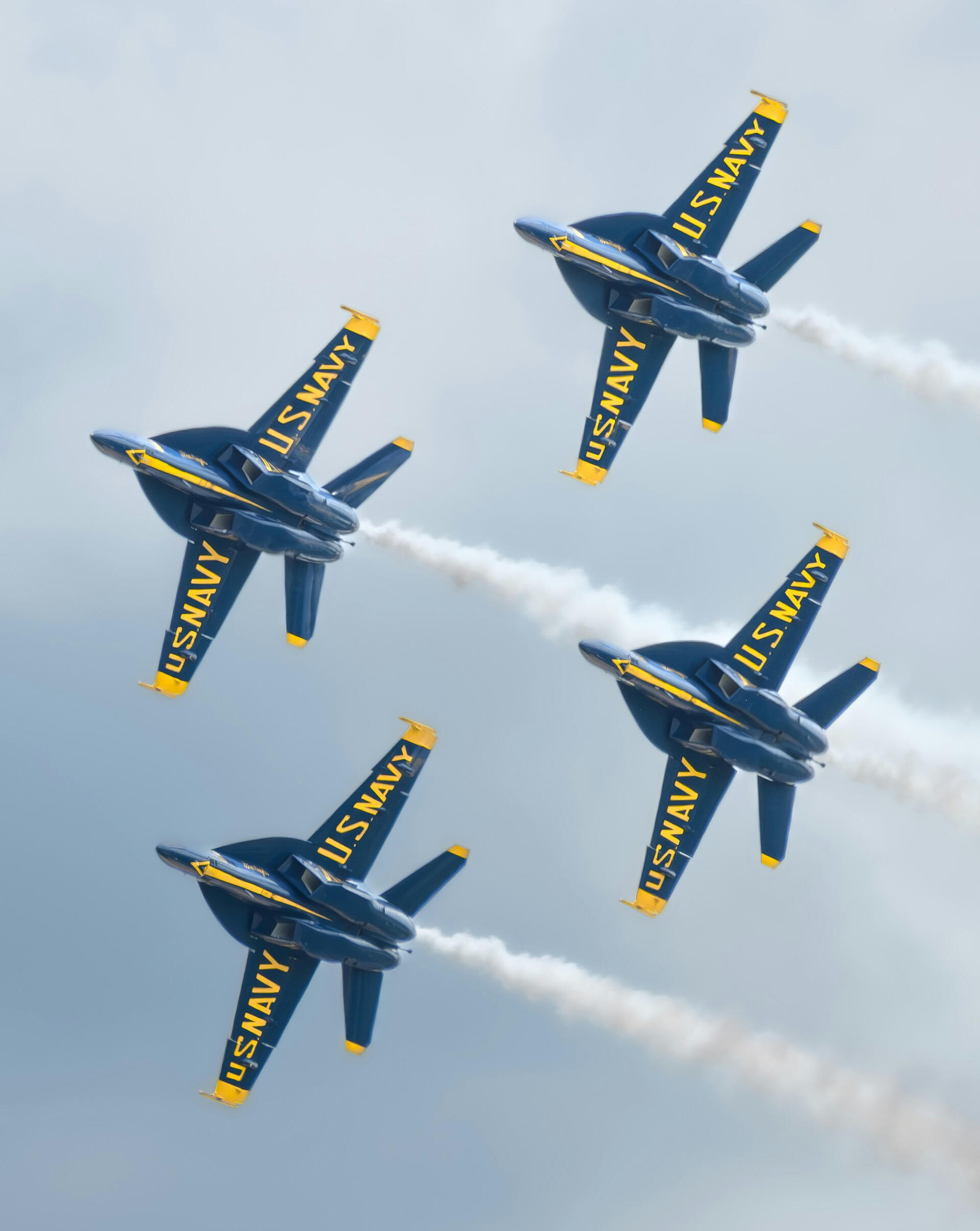 Team Collaboration Operational Transformation A diverse, collaborative team gathered around a laptop, working together with focus and trust—representing people-centered organizational transformation.